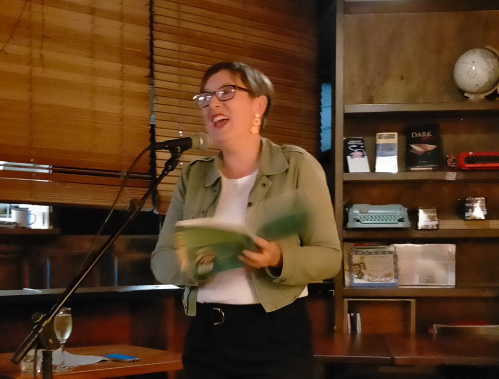 Kirsten laughing at her book reading